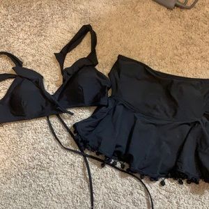 2 black bikini tops